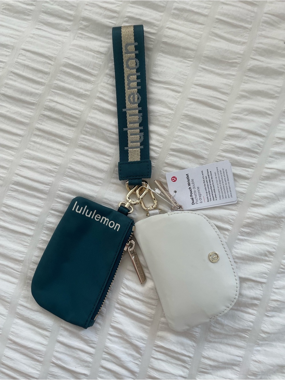 NWT LULULEMON DUAL
POUCH WRISTLET Deep
Storm teal/Gold/Bone OS